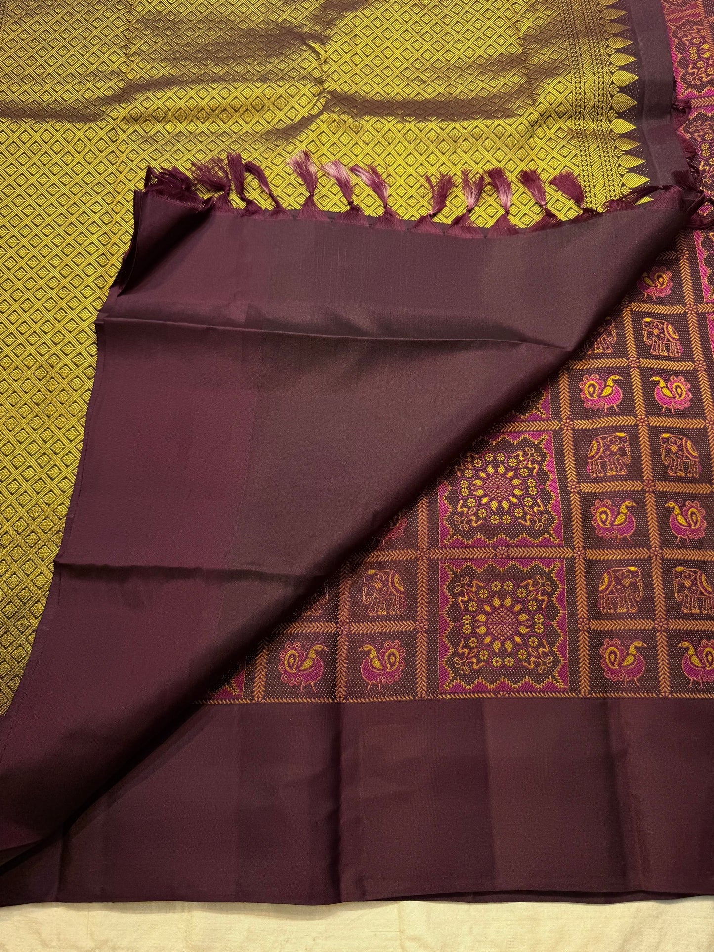 Rich magenta motif border on deep chocolate Kancheevaram pure silk saree Idam Living