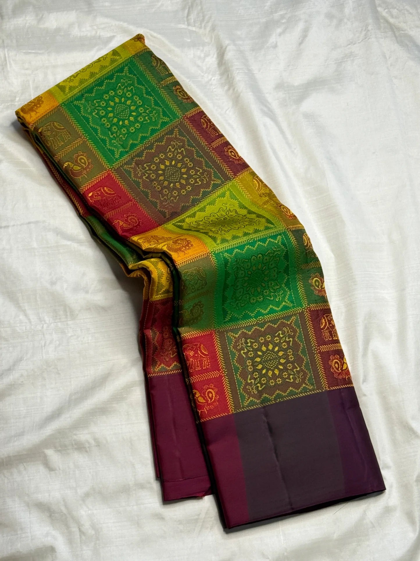 Handwoven Bomkai inspired weave detail on forest green Kanjeevaram silk saree Idam Living