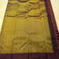 Handwoven Bomkai inspired panel detail on deep chocolate Kanchi silk saree Idam Living