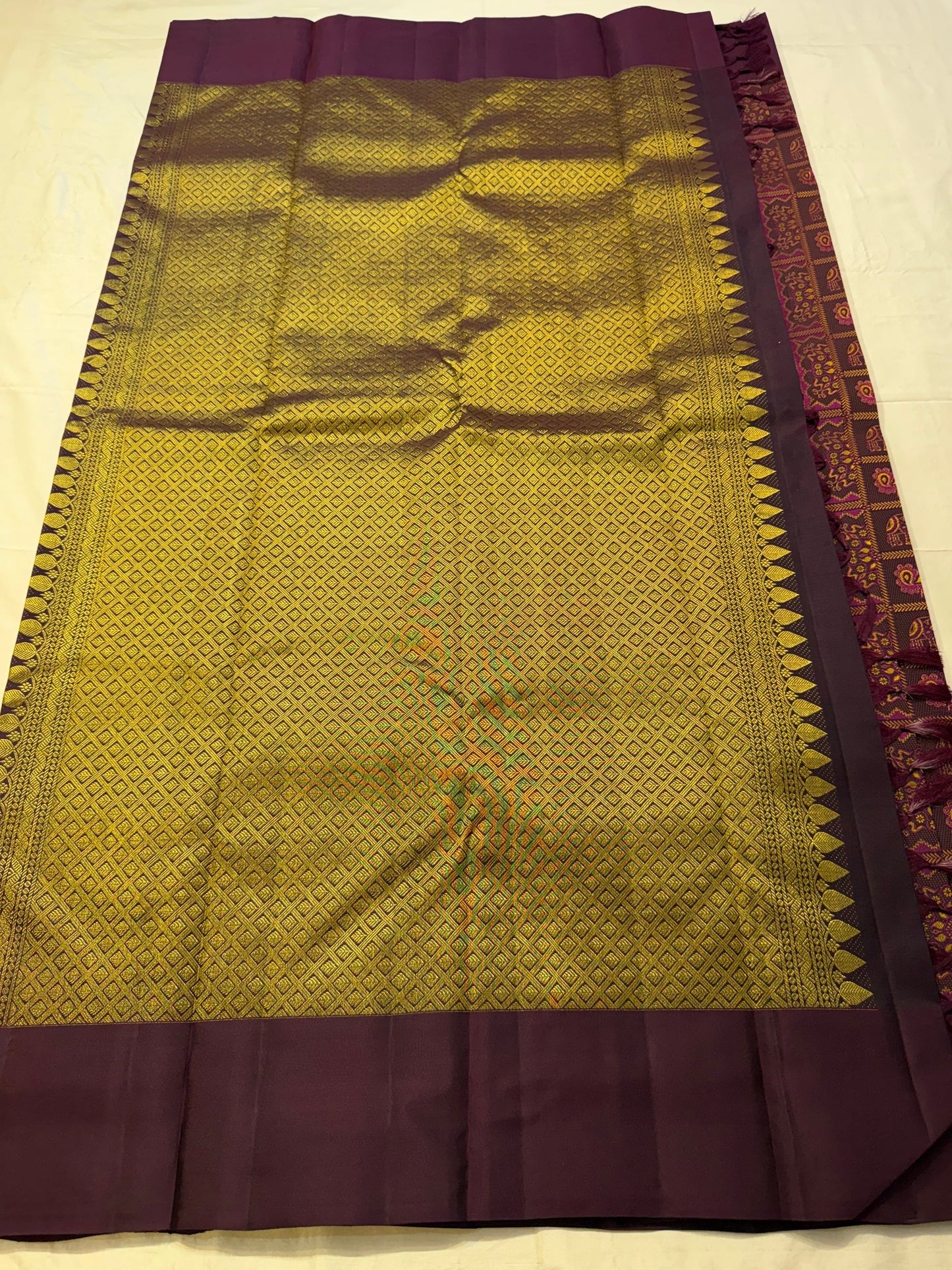 Handwoven Bomkai inspired panel detail on deep chocolate Kanchi silk saree Idam Living