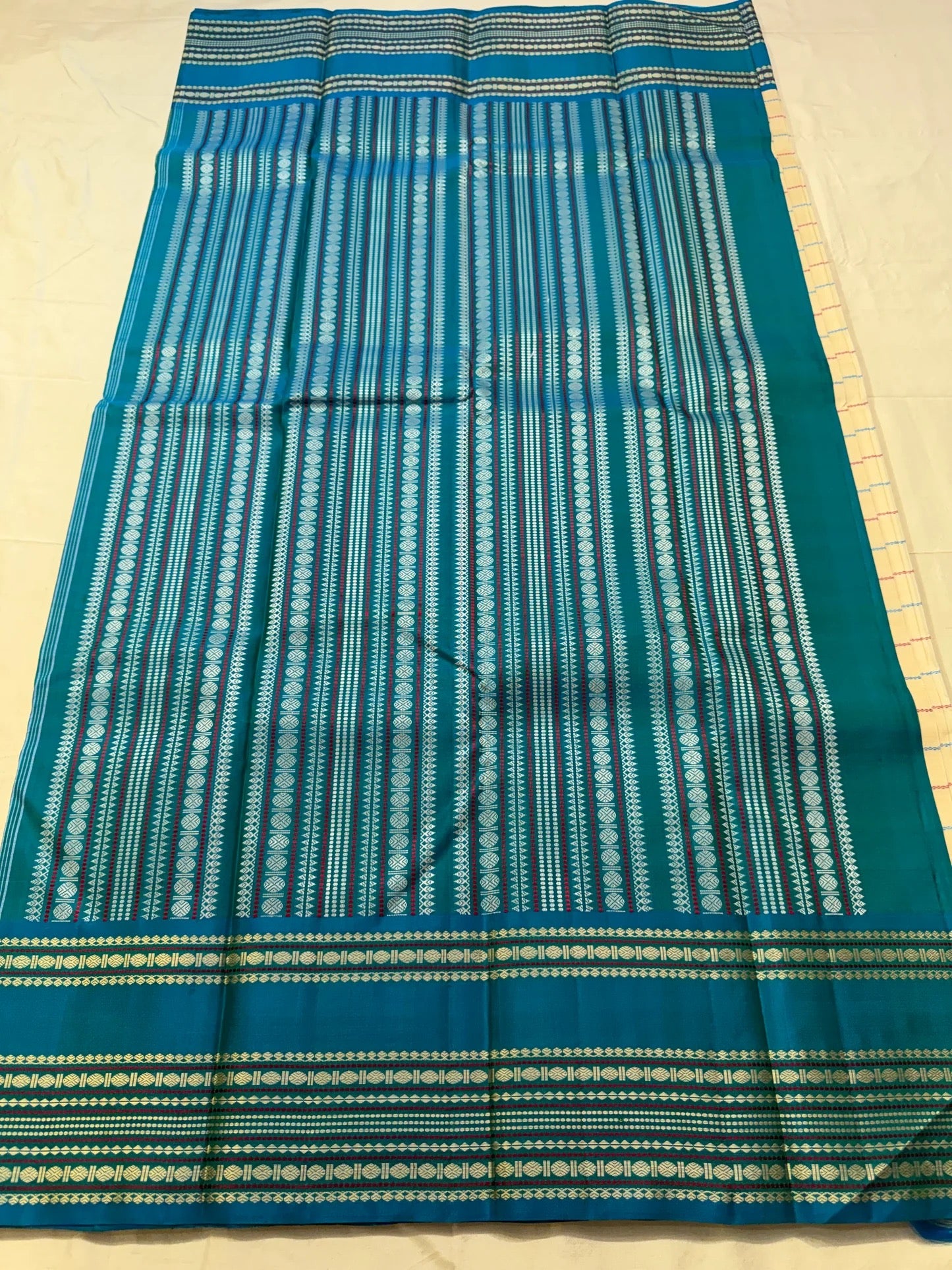 Ivory Cream and Turquoise Blue Kanchipuram Silk Saree – Silk Body Closeup
