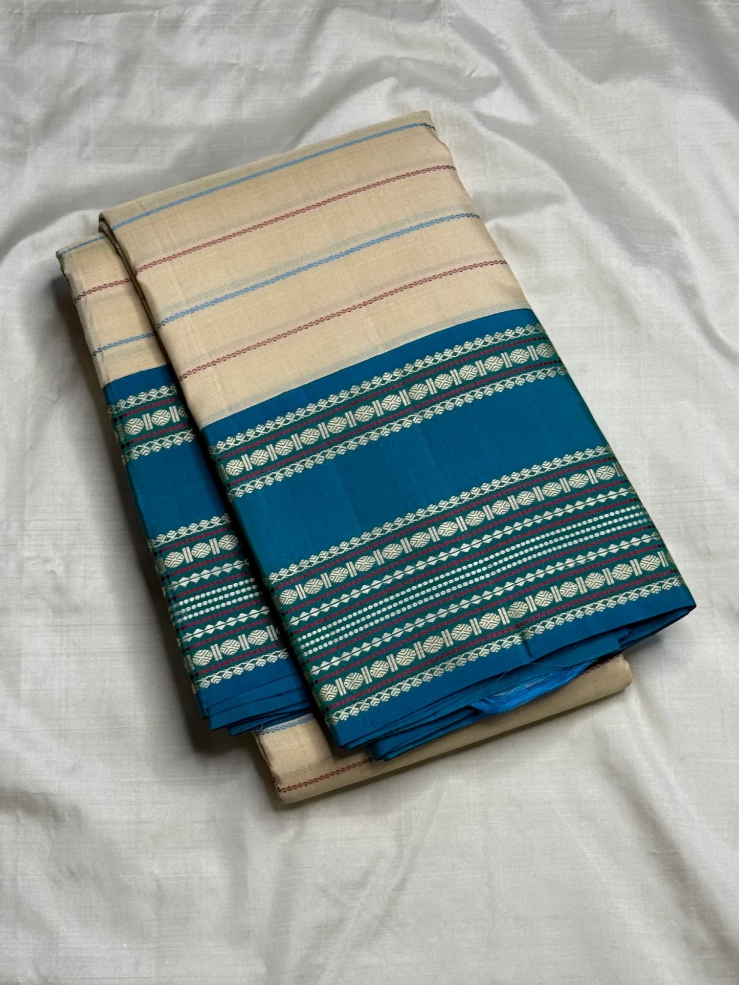 Ivory Cream and Turquoise Blue Kanchipuram Silk Saree – Folded Display View