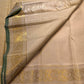 Ivory Kanjeevaram saree showing fine deep green selvedge