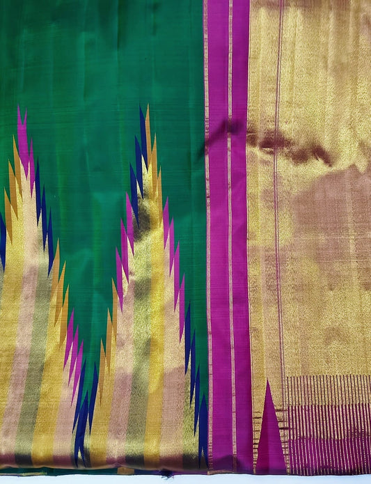 Pure Kanchipuram silk saree green ettukol folded view