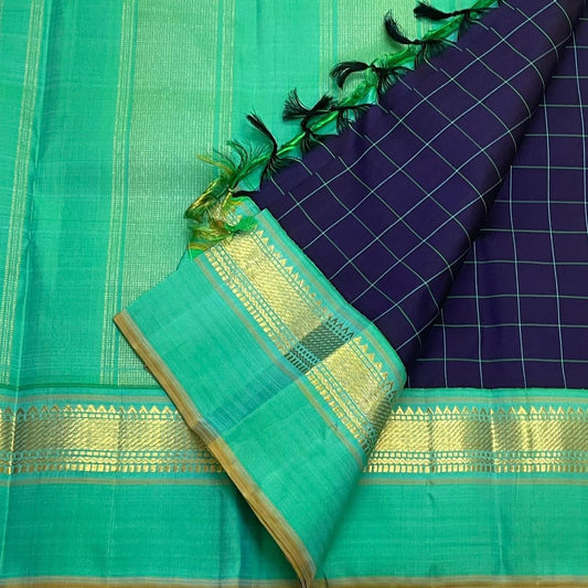 Peacock aqua shot colour Kanchipuram silk saree with deep blue kaal irangiya border