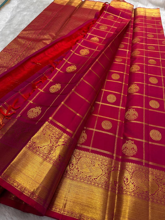 Traditional Kanchipuram silk saree with ornate gold zari border and kattam check design