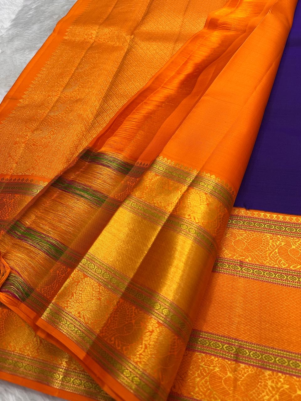 Pure Kanchipuram Silk Saree Purple with Kesar Border and Leaf Butta