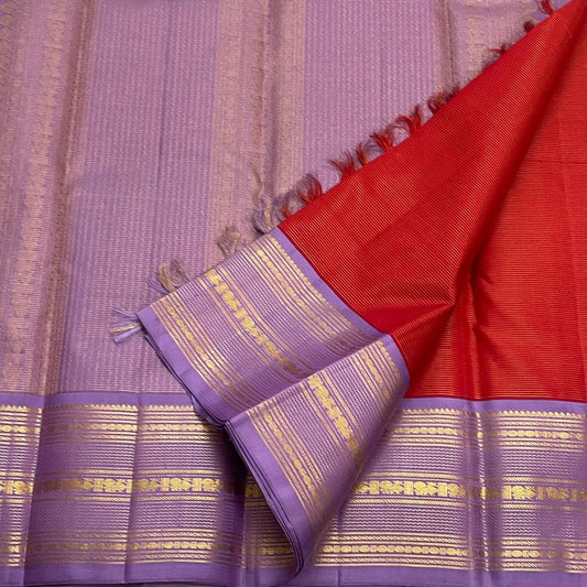 Pure Kanchipuram silk saree red body with lavender korvai border classic gold zari draped view