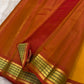 Mustard and Rust Handwoven Pure Silk Kanchipuram Saree with Gold Zari Band Border.