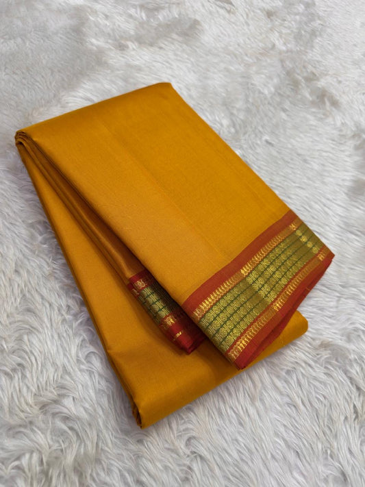 Mustard and Rust Handwoven Pure Silk Kanchipuram Saree with Gold Zari Band Border.
