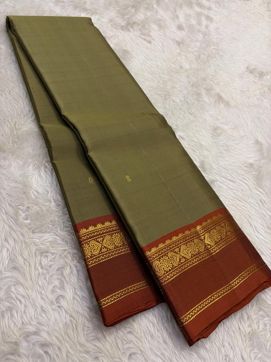 Olive and Rust Handwoven Pure Silk Kanchipuram Saree with Gold Zari Floral Border.