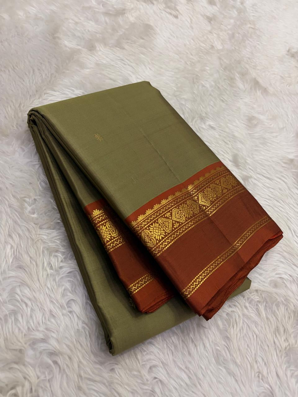 Olive and Rust Handwoven Pure Silk Kanchipuram Saree with Gold Zari Floral Border.