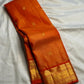 Sunset Orange Vairaoosi Kanjivaram saree grand gold zari border detail