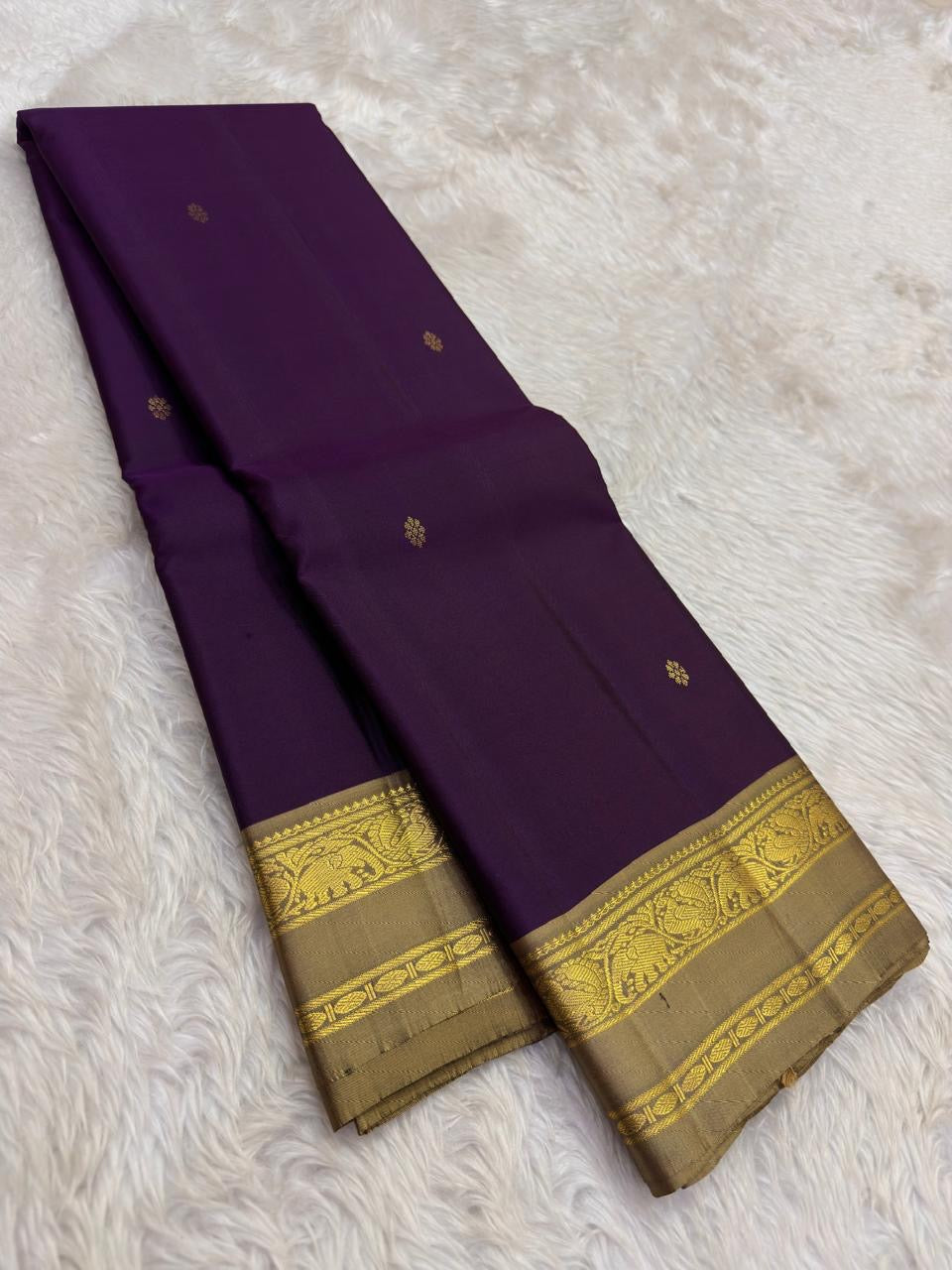 Purple and Gold Handwoven Pure Silk Kanchipuram Saree with Elephant Zari Border.