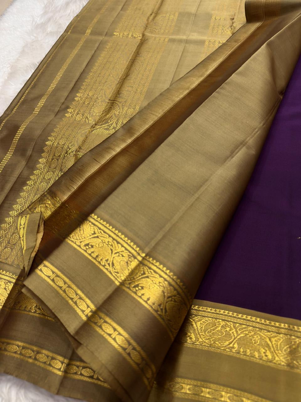 Purple and Gold Handwoven Pure Silk Kanchipuram Saree with Elephant Zari Border.