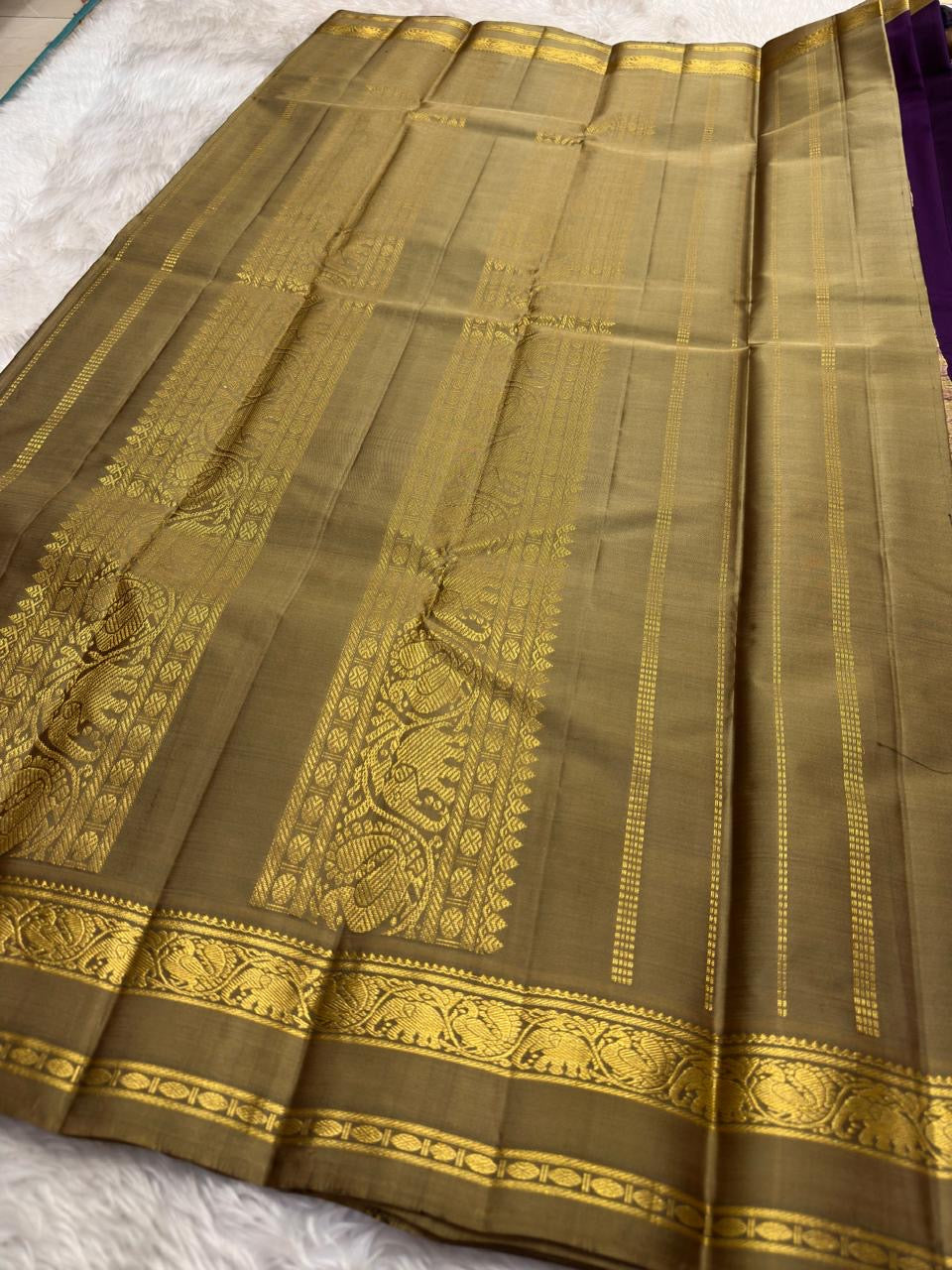 Purple and Gold Handwoven Pure Silk Kanchipuram Saree with Elephant Zari Border.