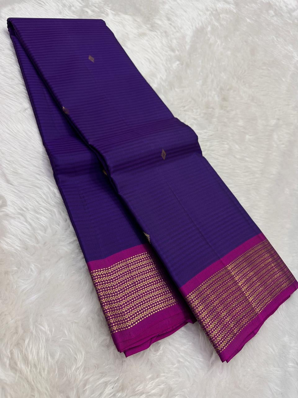Purple and Magenta Handwoven Pure Silk Kanchipuram Saree with Chevron Zari Border.