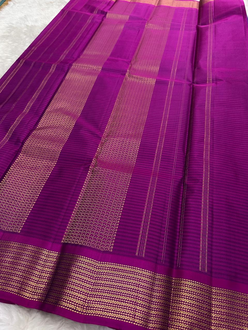 Purple and Magenta Handwoven Pure Silk Kanchipuram Saree with Chevron Zari Border.
