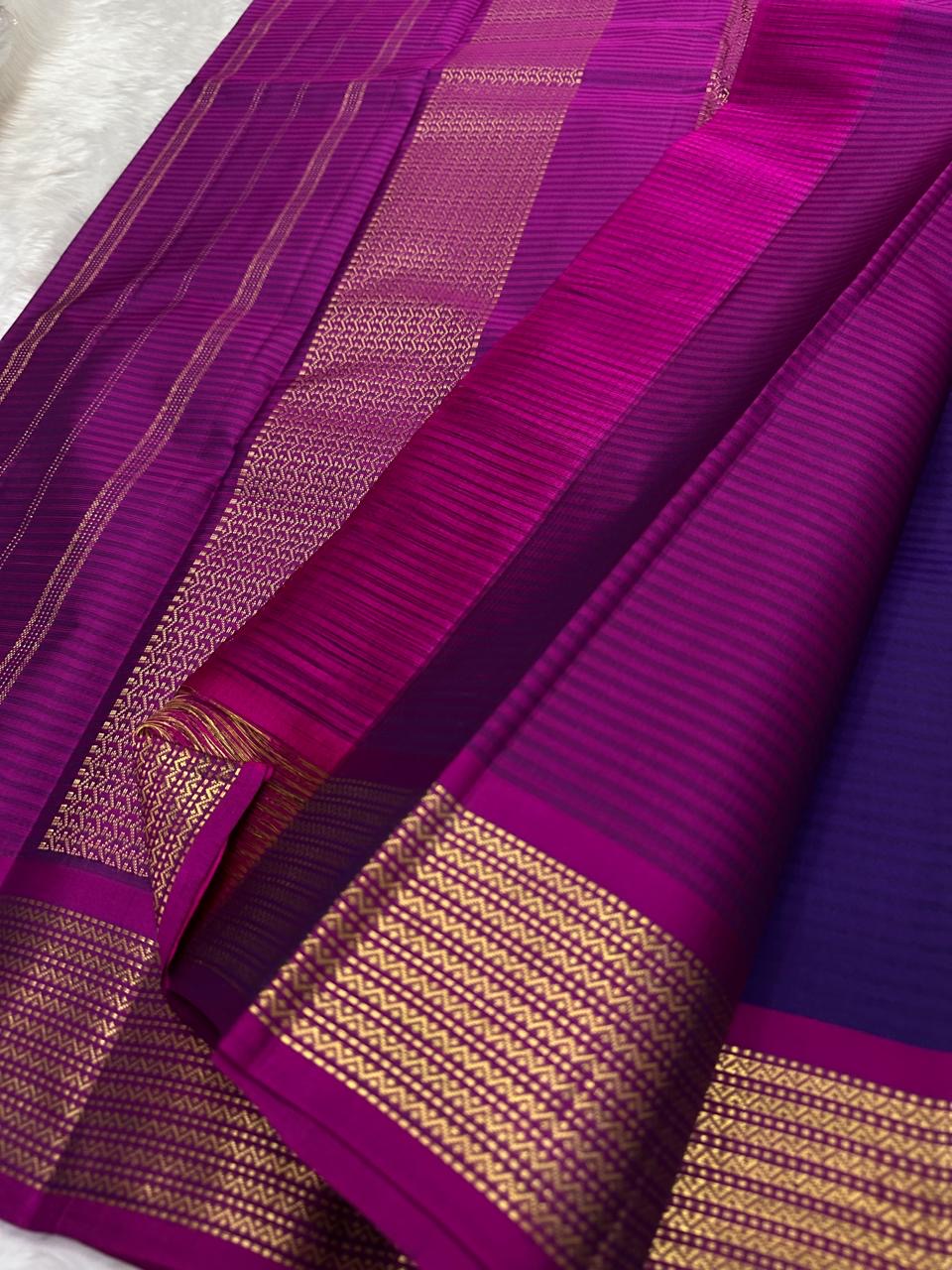Purple and Magenta Handwoven Pure Silk Kanchipuram Saree with Chevron Zari Border.