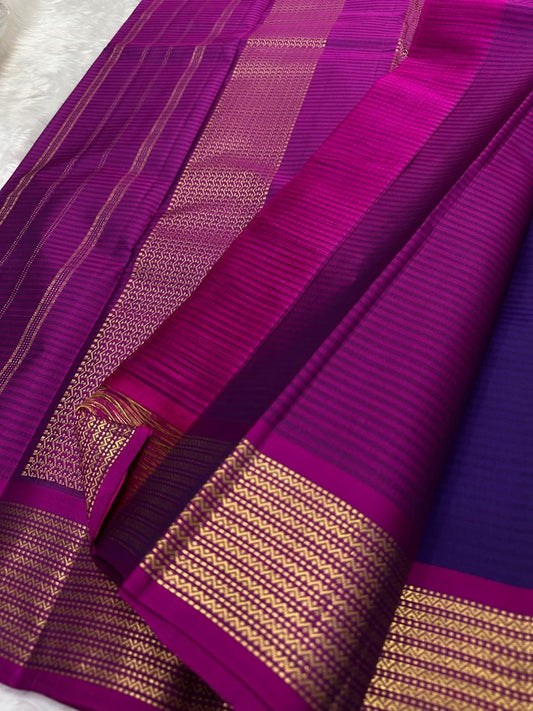 Purple and Magenta Handwoven Pure Silk Kanchipuram Saree with Chevron Zari Border.