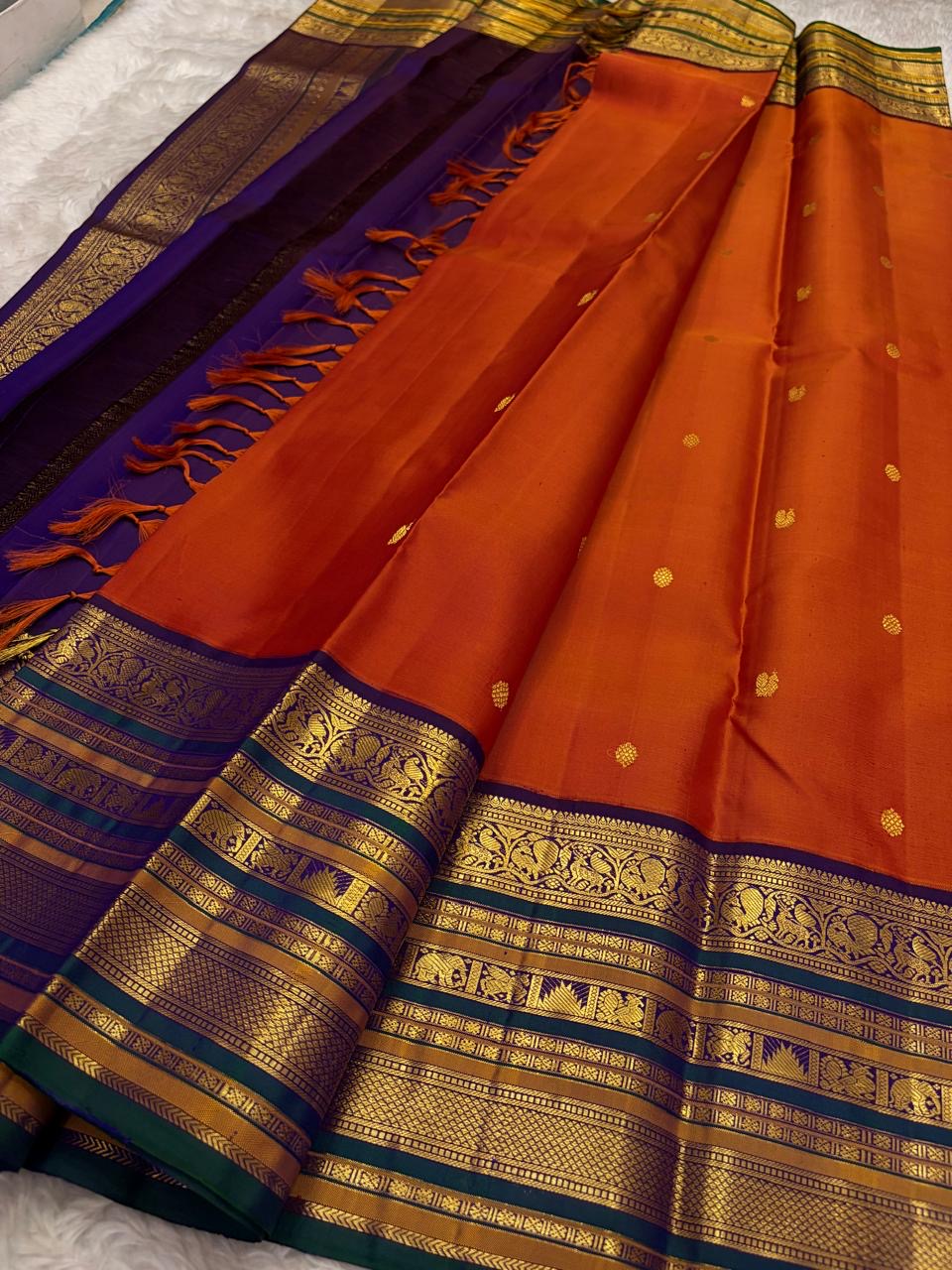 Burnt Rust and Violet Kanchipuram Silk Saree – Rich Zari Border Closeup