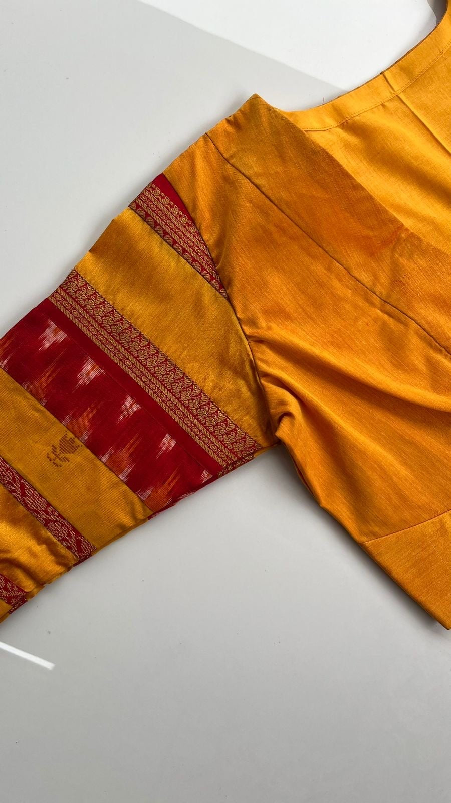Yellow Saatchi handloom ikkat blouse with silk cotton fabric and traditional zari detailing