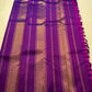 Royal orchid purple Kanjeevaram silk saree with emerald green contrast border and classic handwoven detailing