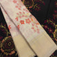 Close view of soft multicolour floral zari jaal woven across Pearl Ivory pure silk.
