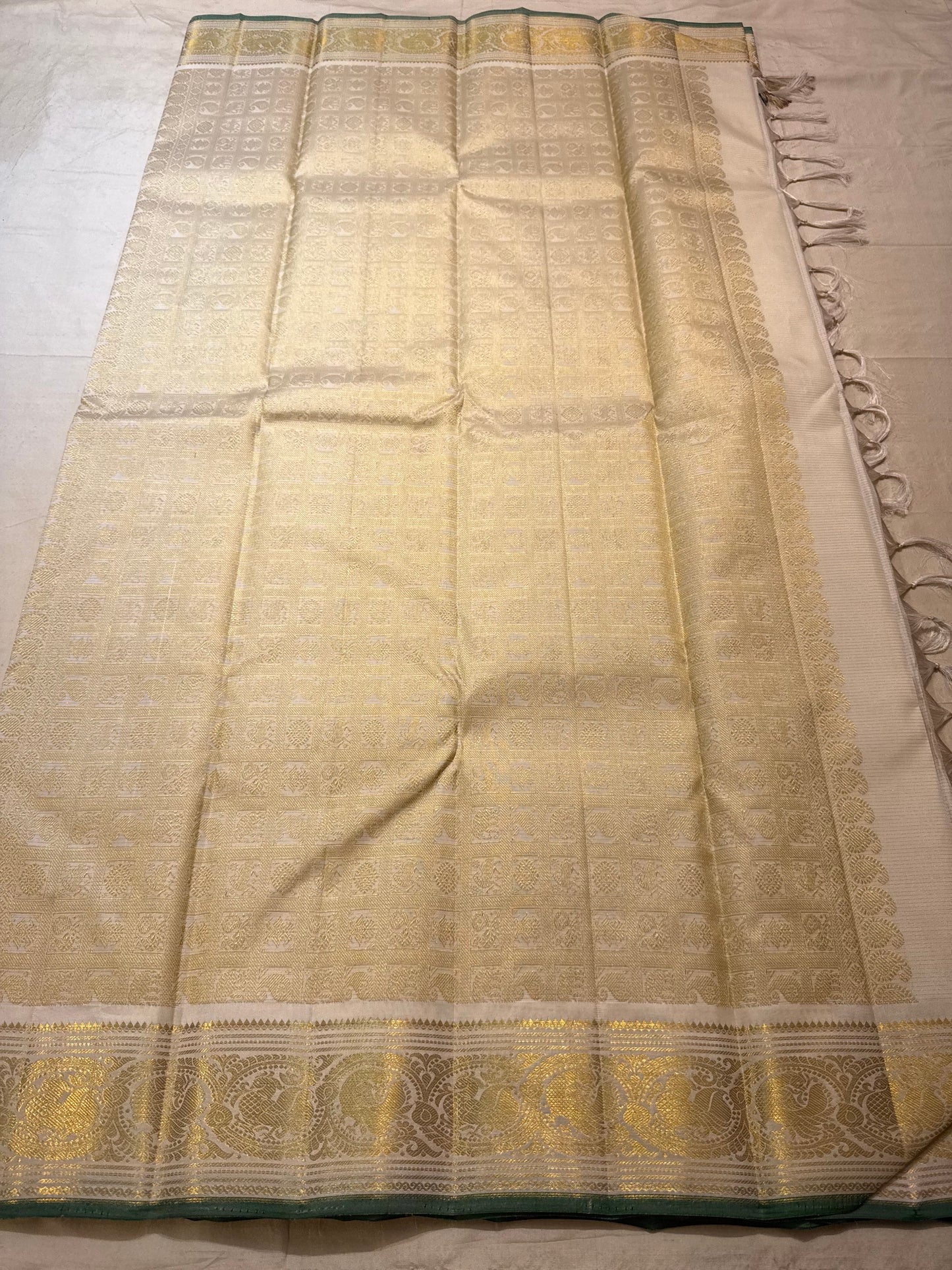 Vairaoosi Kanjeevaram saree with Mayil Chakram gold zari motifs detail