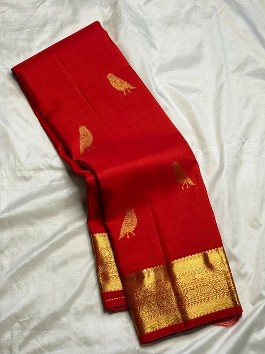 Handwoven vermillion Kanjeevaram silk saree with bird motif buttas – Idam Living
