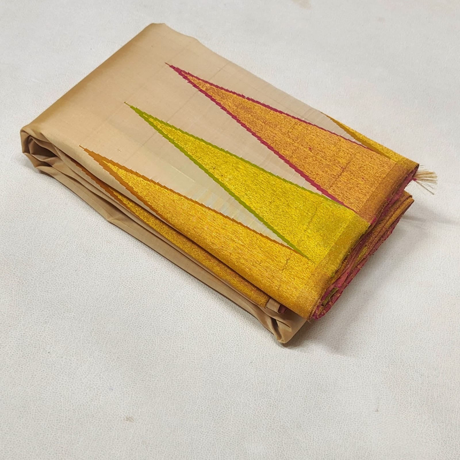 Ivory pure silk Kanchipuram saree with ettukol weave and multicolour temple border with antique gold zari pallu