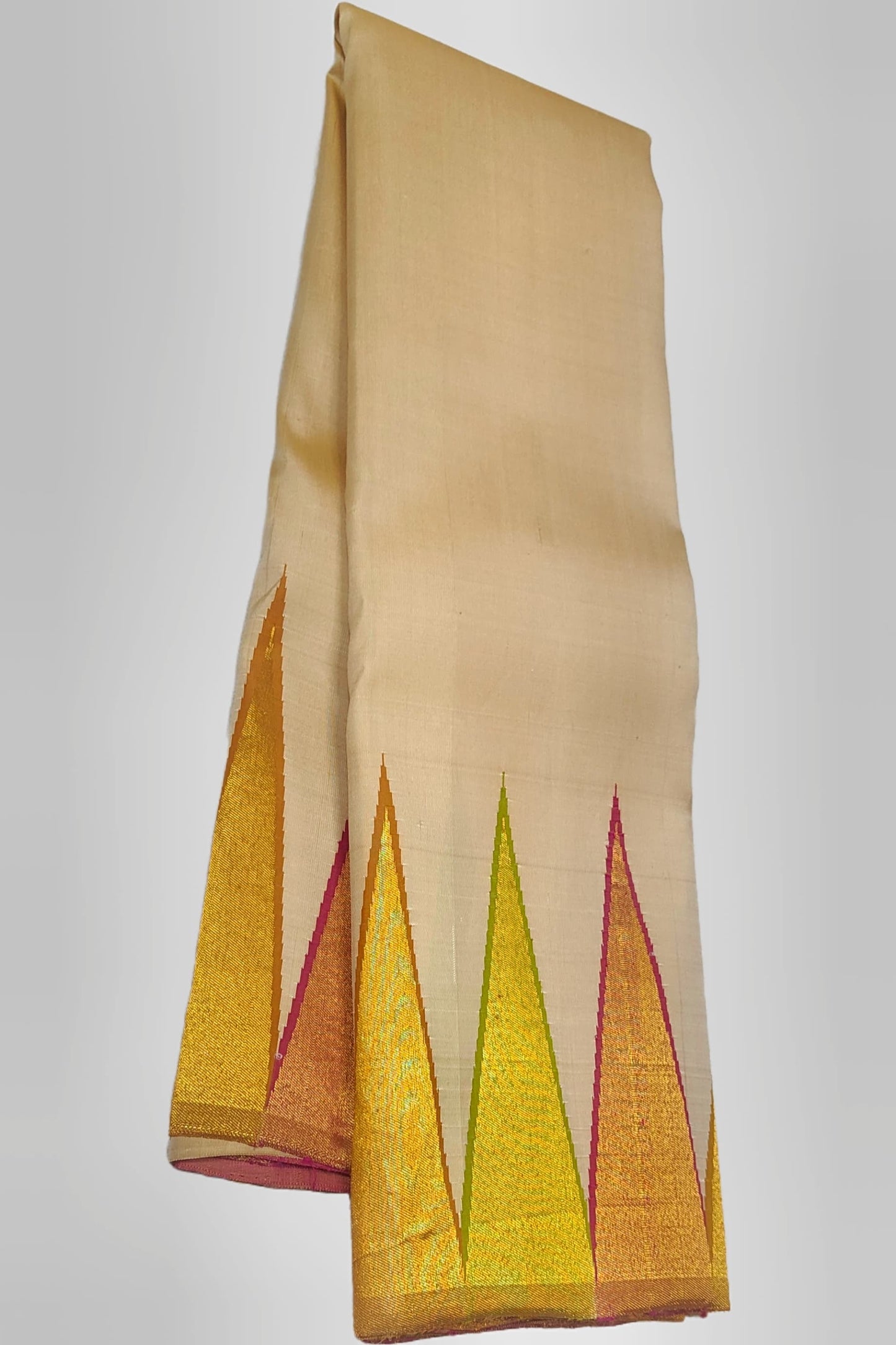 Elegant ivory pure silk Kanchipuram saree with ettukol structure and temple inspired triangular border