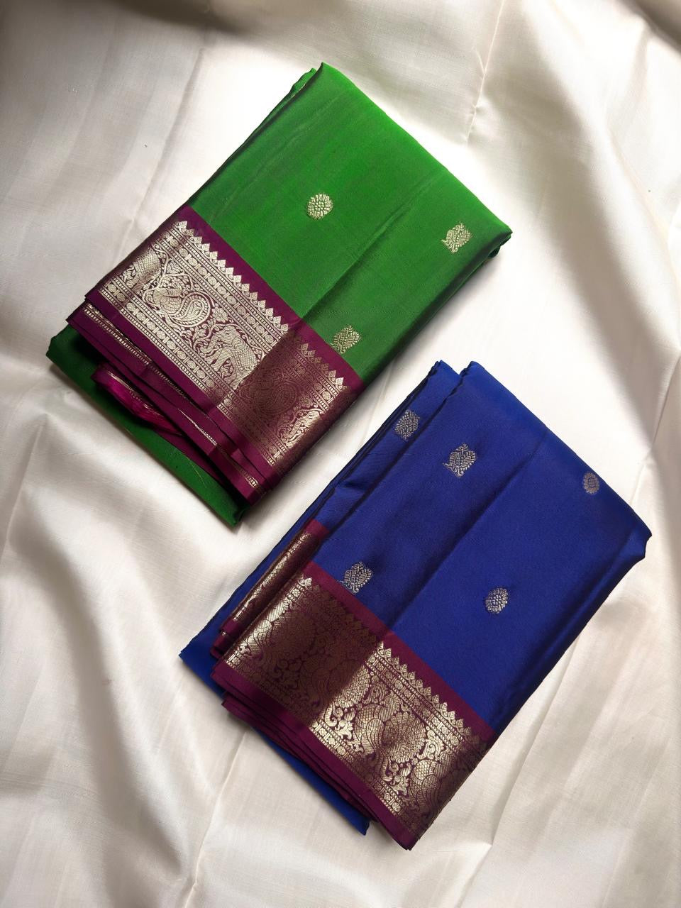 Ilai Pachai Green pure silk Kanjivaram Butta saree with Vadamalli Purple contrast border.