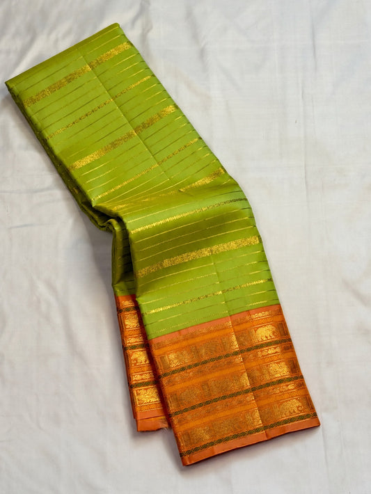 Ilampachai Pure Silk Kanchipuram Vairaoosi saree with luminous zari stripes and peach-gold border.
