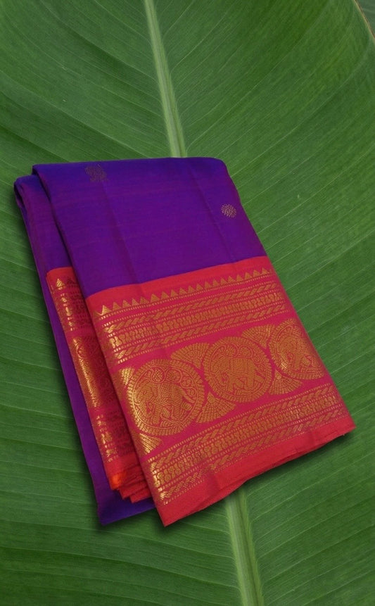 Imperial violet Kanchipuram silk saree with antique gold zari and ornate korvai border