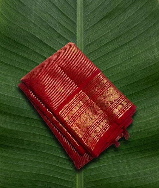 deep red Kanchipuram silk saree with v weave folded view