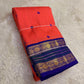 Indian wedding Kanchipuram silk saree coral sunset orange with royal violet border