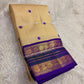 Indian wedding Kanchipuram silk saree sandal beige with regal violet korvai border