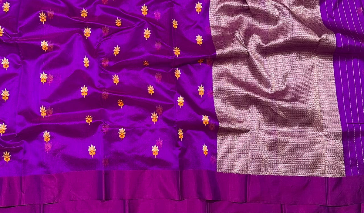 Orchid purple Chanderi Pattu Silk saree with golden saffron and ivory floral motifs and shimmering silvery-lilac pallu.