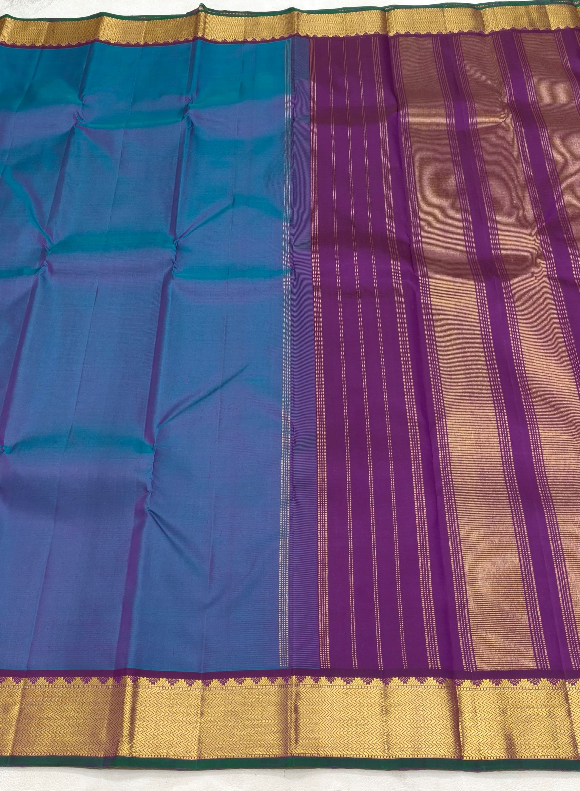Indigo blue Kancheevaram silk saree with traditional zari seer pallu – festive occasion