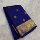 Authentic Kancheepuram silk saree featuring deep blue silk and intricate antique gold peacock weaving