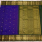 Close view of blue shot indigo silk body with small woven Mayil and Kamalam buttas