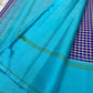 Indigo and ivory checked Kanchipuram silk saree with lagoon-turquoise pallu