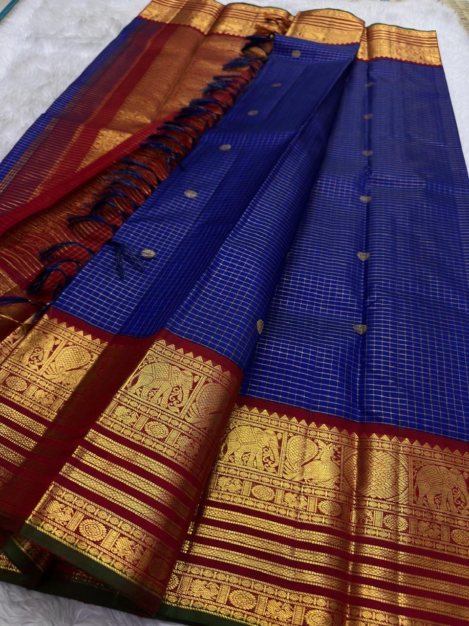 Indigo Kanchi Pattu saree with Zari Kattam weave and maroon elephant border — Idam Living