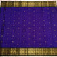 Deep indigo Pure Silk Kanchipuram saree with bottle green zari border and rich pallu detail