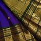 Bottle green zari border featuring Sorgavaasal Yaanai elephants inside circular ornamental forms