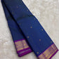Deep blue Kanjivaram silk saree with traditional antique gold grid detailing