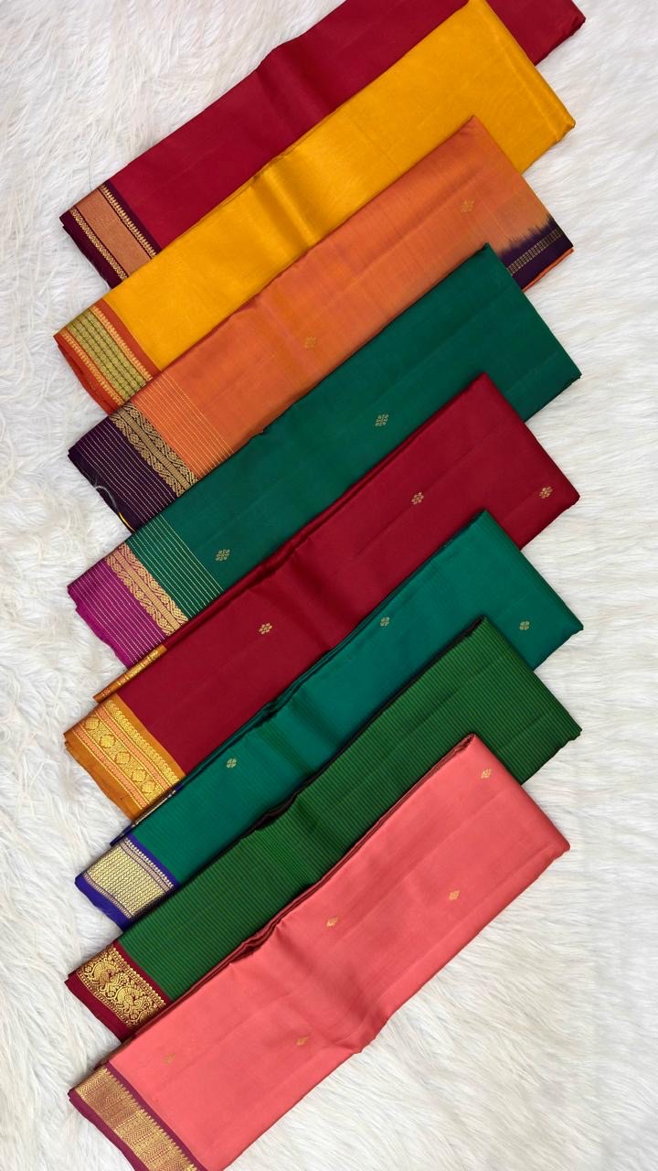 Emerald Green and Neelam Violet-Blue lightweight Kanchipuram silk saree, geometric gold zari border and patterned violet-blue pallu; zari pattern