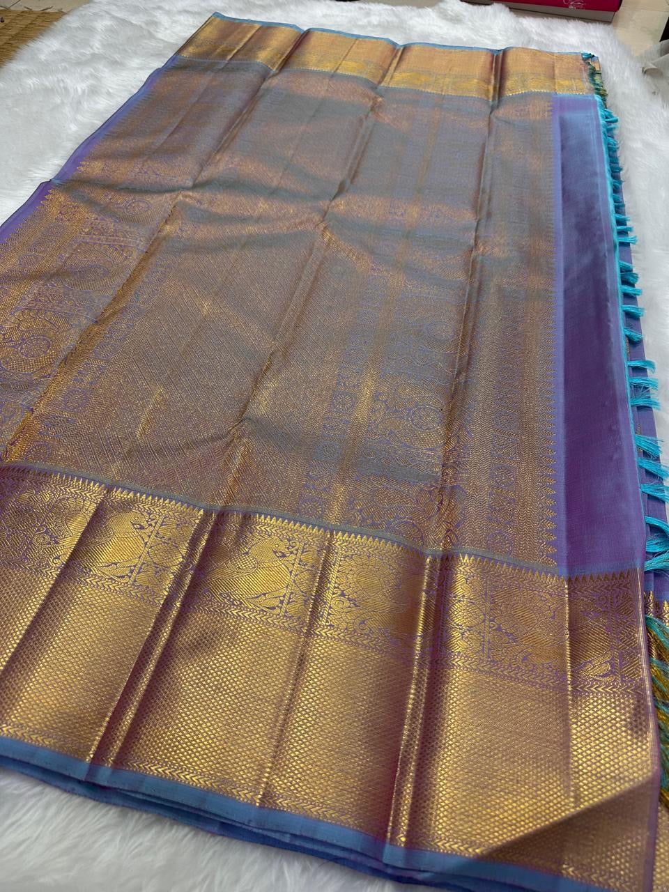 Iridescent Lavender Blue pure silk Kancheepuram saree, Butta weave with Antique Gold Zari border — body weave close-up