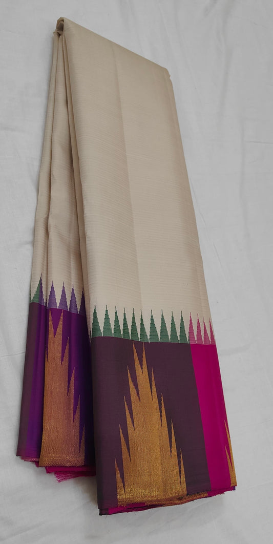 Ivory beige handwoven Pure Silk Kanjeevaram saree with aubergine Ettukol border
